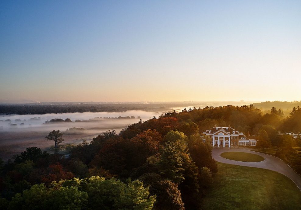 Aerial Photo of Langdon Hall At Dawn With Mist Over the Trees In Distance